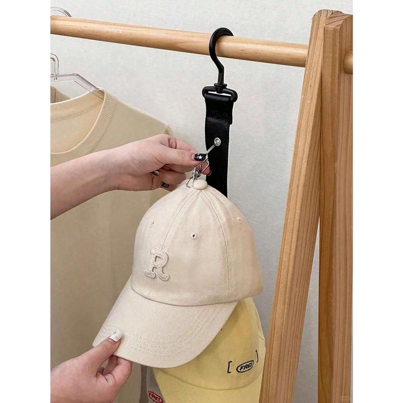 A Multi-Colored Hat Storage Organizer For Men And Women, Hanging Rack With Multiple Clips And Hooks For Closets And Cabinet Doors