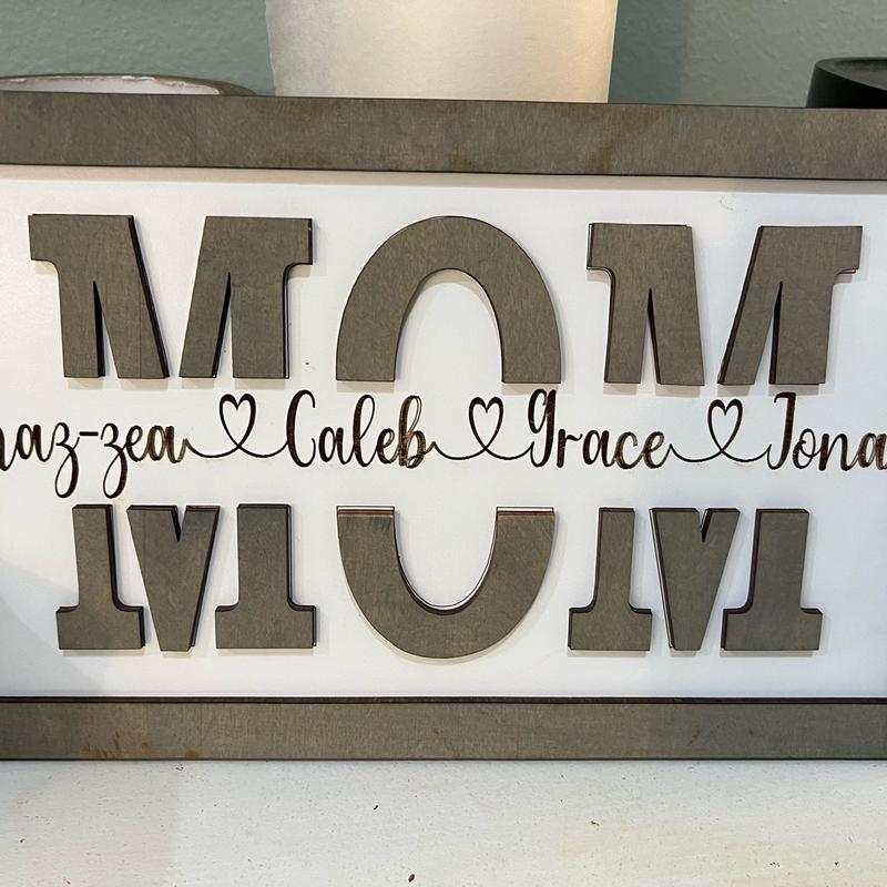 Mom split sign with kids names